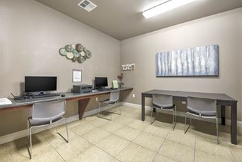 Community business center with computer stations and artwork